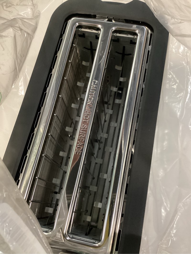 Condition photo showing As Is for elite gourmet ect-3100 long slot 4 slice toaster, reheat, 6 toast settings, defrost, cancel functions, built-in warming rack, extra wide slots for bagels & waffles, stainless steel & black