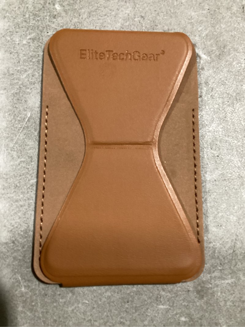 Condition photo showing Good Condition for elite tech gear secure phone card holder with adjustable stand brown