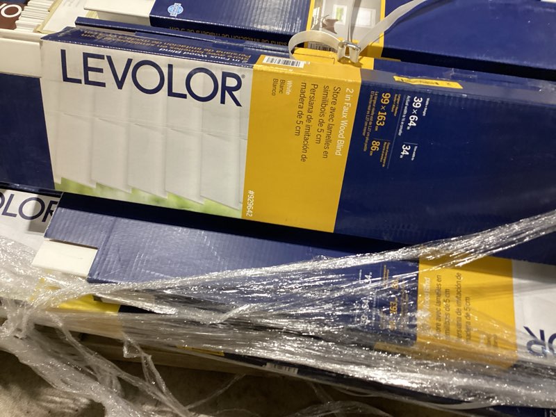 Condition photo showing As Is for levolor trim+go 2-in slat width 39-in x 64-in cordless white faux wood room darkening horizontal blinds