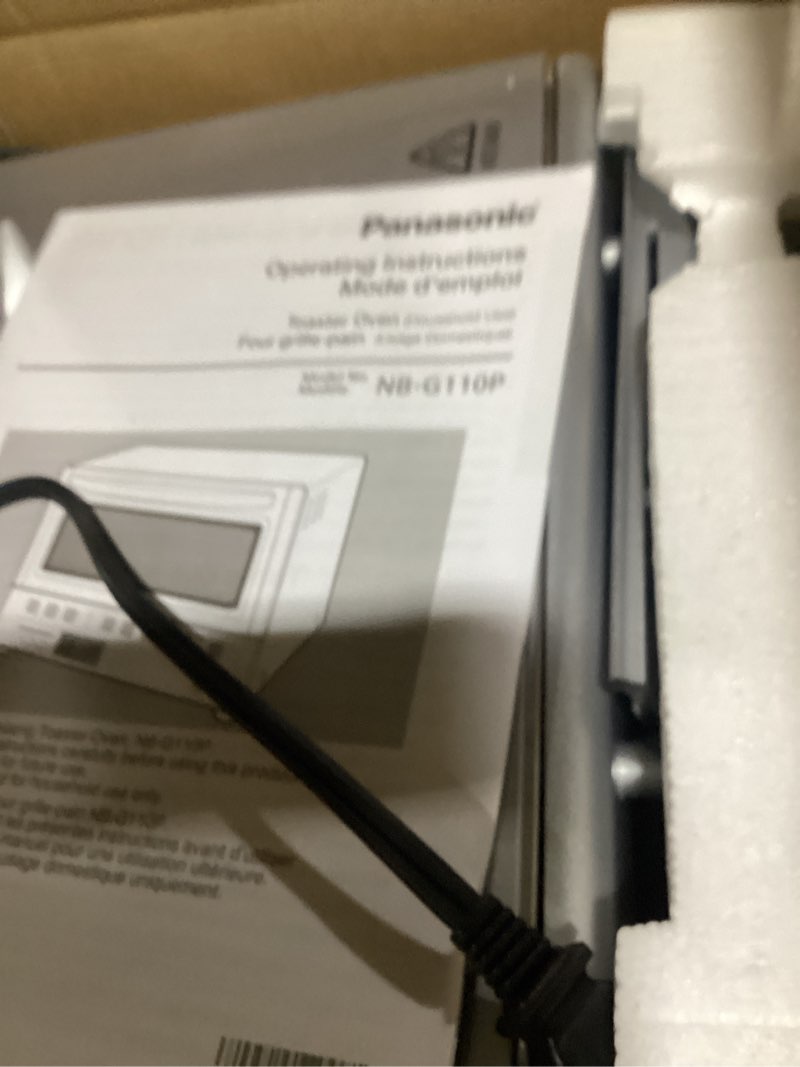 Condition photo showing As Is for Panasonic FlashXpress Toaster Oven Countertop, 4-Slice Small Toaster Oven Compact Size with Double Infrared Heating, 6 Auto Cook Options and Precise Temperature Control, 1300W - NB-G110P (Silver) FlashXpress Compact Matte Silver