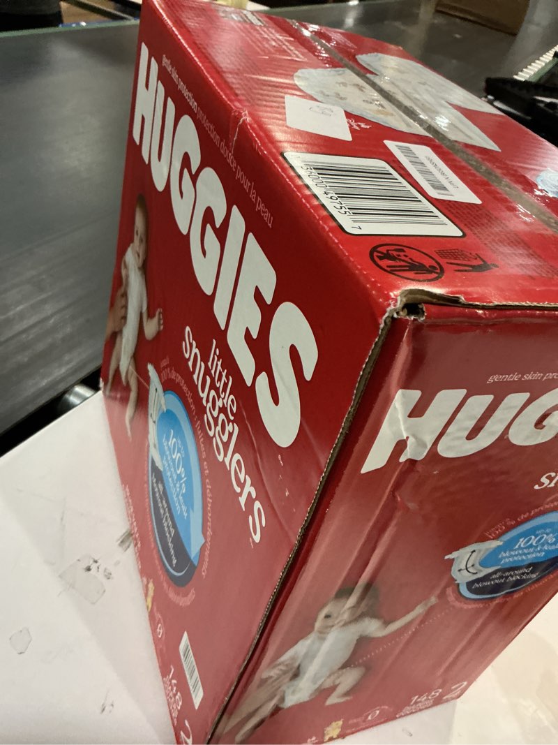 Condition photo showing New/Like New for huggies size 2 diapers, little snugglers baby diapers, size 2 (12-18 lbs), 148 count size 2 148