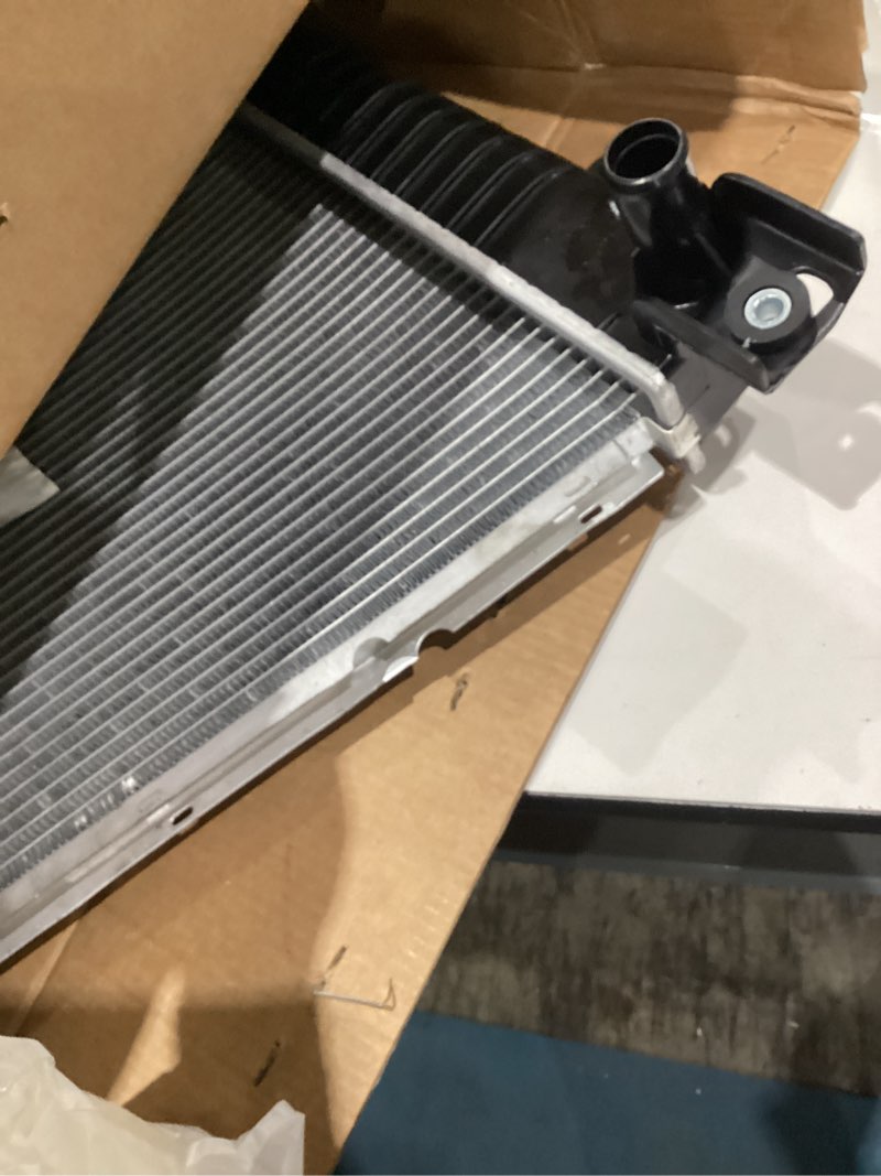Condition photo showing Good Condition for spectra premium cu2423 radiator with toc, without eoc - 34-1/16" core compatible with chevrolet silverado, gmc and cadillac