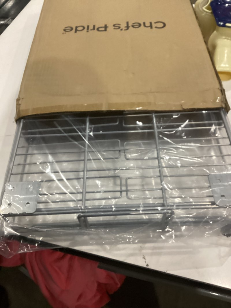 Condition photo showing Good Condition for expandable rolling metal basket by chef's pride