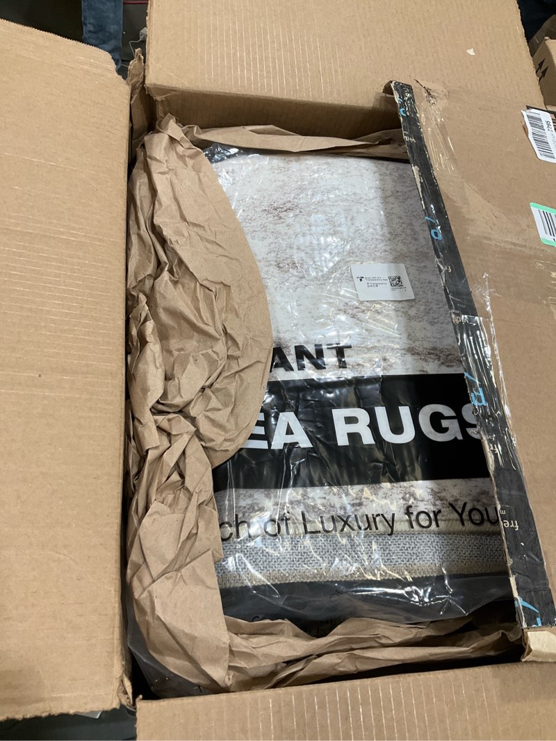 Condition photo showing Good Condition for RUUGME 8x10 Area Rugs Abstract: Washable Living Room Rug Non-Slip Low Pile Stain Resistant Throw Rugs for Bedroom Dining Room - Large Soft Indoor Carpet for Modern Farmhouse Decor (8X10 Beige-Brick) 8' x 10' (Rectangular) Brick/Brown/Beige