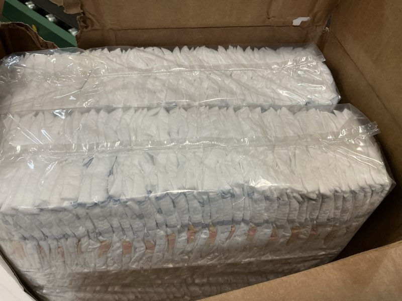 Condition photo showing New/Like New for huggies size 2 diapers, little snugglers baby diapers, size 2 (12-18 lbs), 148 count size 2 148