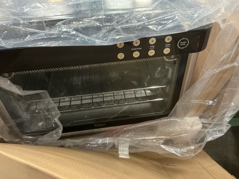 Condition photo showing As Is for ninja air fryer & toaster oven | foodi series, xl pro air oven kitchen countertop convection | 10-in-1 functions | fits a 5-lb chicken & sheet pan of vegetables | 1800 watts | stainless steel | dt201