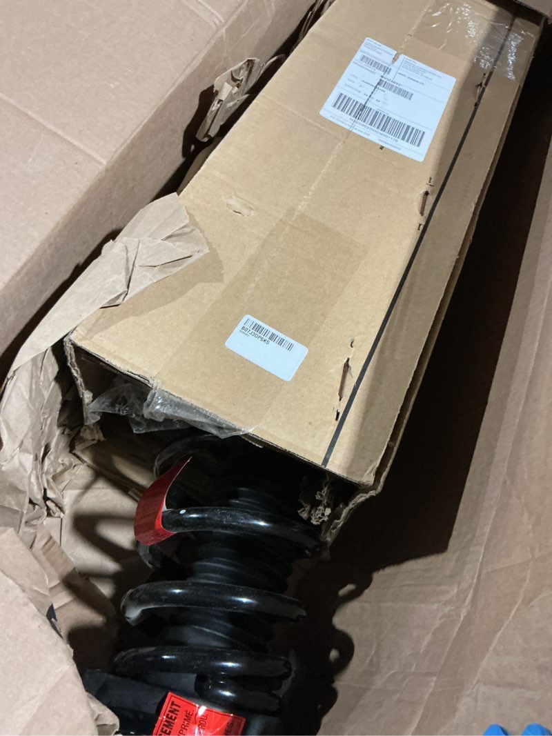 Condition photo showing As Is for monroe quick-strut 172964 suspension strut and coil spring assembly for toyota venza