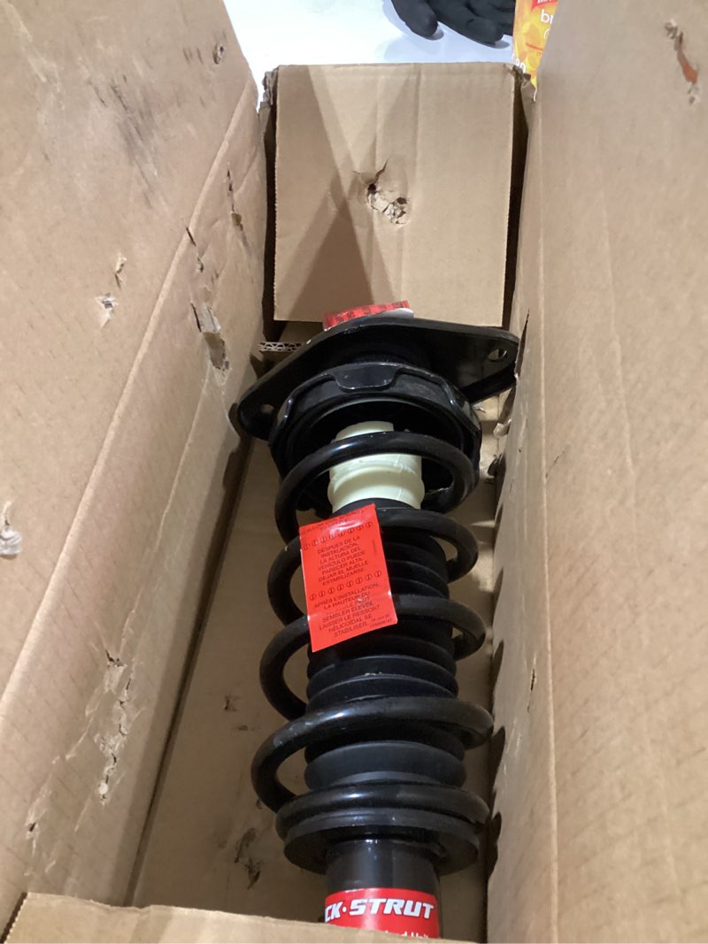 Condition photo showing As Is for monroe quick-strut 172482l suspension strut and coil spring assembly for mini cooper