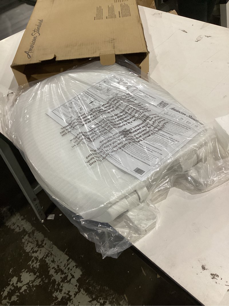 Condition photo showing As Is for american standard 5503a00b.020 transitional elongated toilet seat soft close, white elongated front