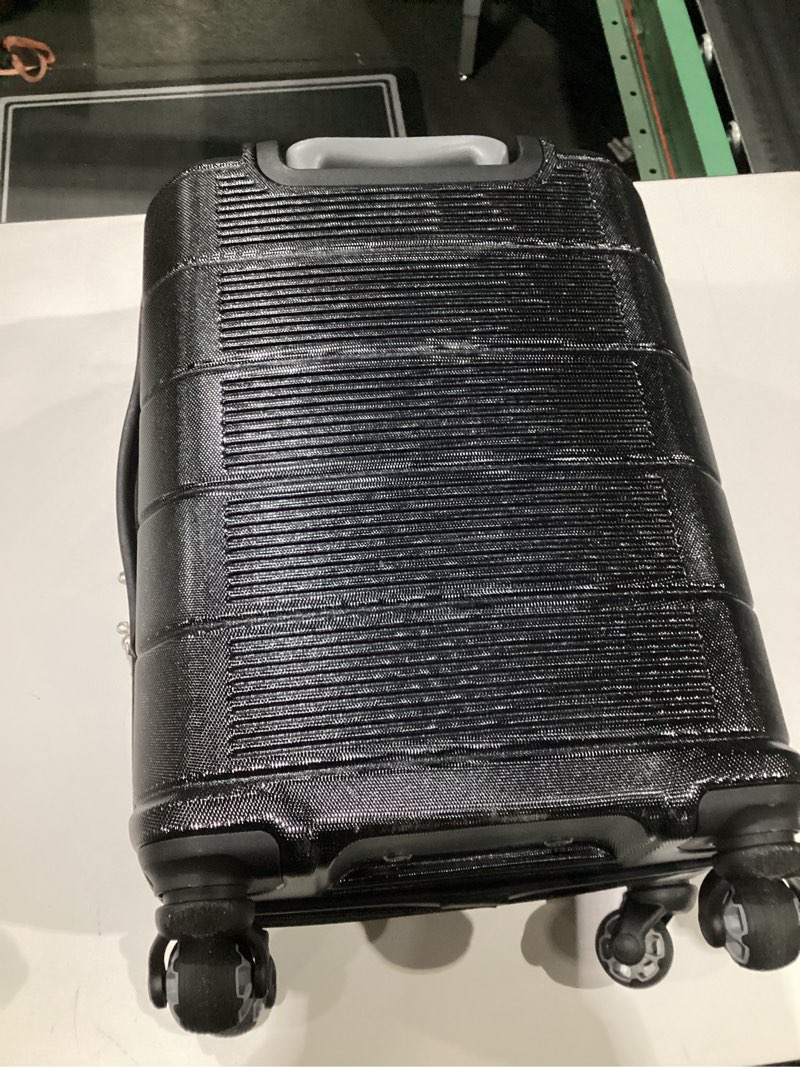 Condition photo showing As Is for American Tourister Stratum 2.0 Expandable Hardside Luggage with Spinner Wheels, Jet Black, Carry-on 20-Inch Carry-On Jet Black