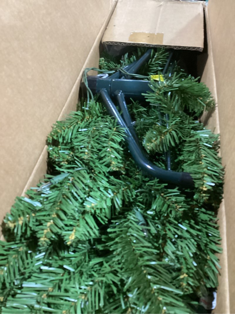 Condition photo showing item condition for National Tree Company 4.5 ft Pre-Lit Kingswood Fir Slim Artificial Christmas Tree, 150 Clear Lights, 330 Tips, Includes Stand, Green