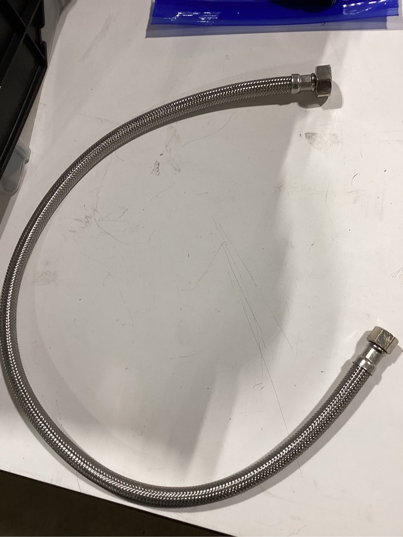 Condition photo showing Good Condition for reliabilt 3/8-in flare x 1/2-in fip x 20-in braided stainless steel flexible faucet supply line