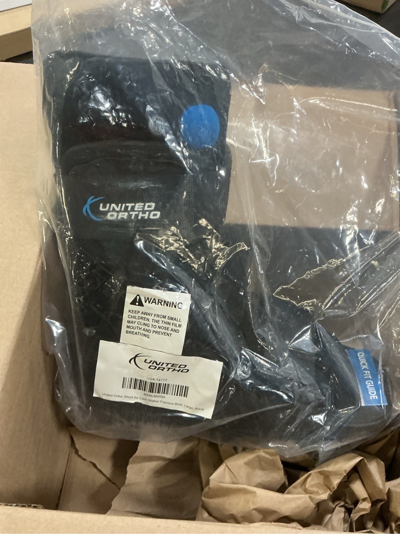Condition photo showing New/Like New for united ortho short air cam walker fracture boot, large, black black large boot