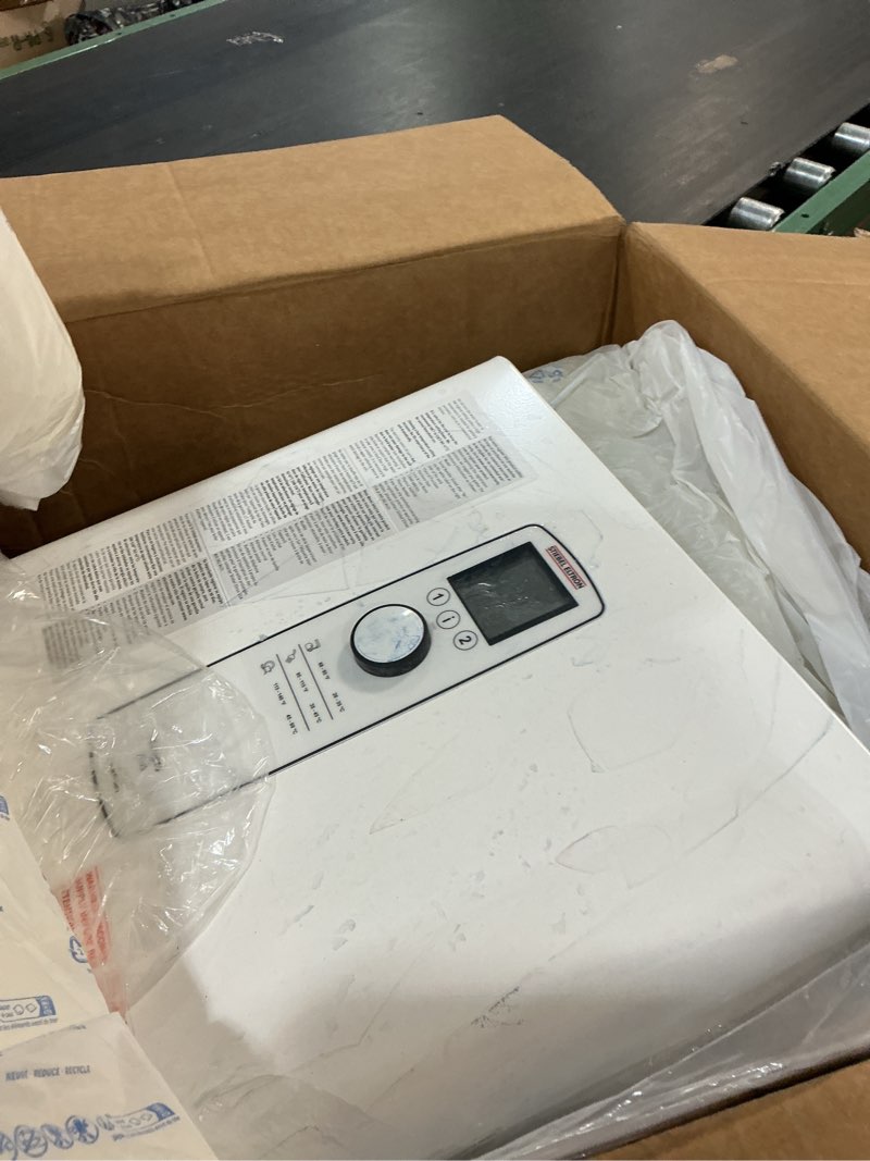Condition photo showing As Is for stiebel eltron tankless water heater – tempra 36 plus – electric, on demand hot water, eco, white 36 (kw) tempra plus
