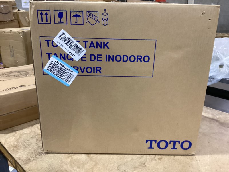Condition photo showing As Is for toto drake two-piece elongated 1.28 gpf tornado flush toilet tank, washlet+ ready, cotton white - ms776124ceg#01 toilet tank 1.28 gpf standard