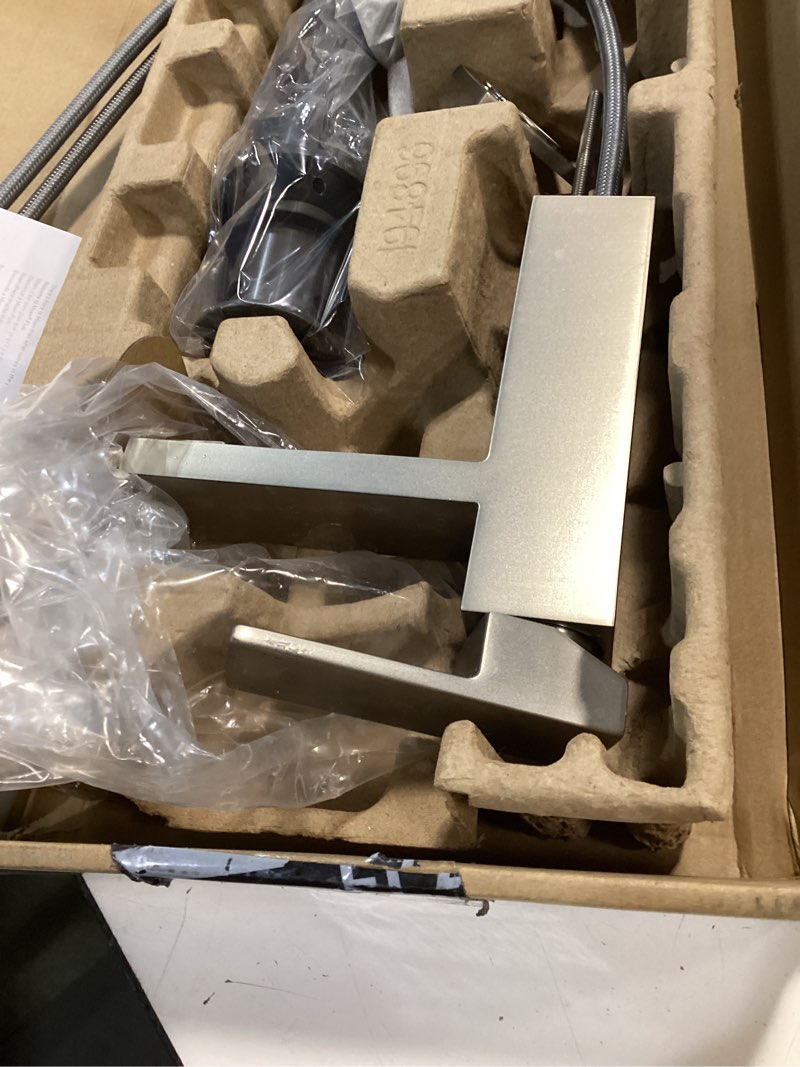 Condition photo showing As Is for moen revyl spot resist nickel one-handle single hole modern bathroom sink faucet with optional deckplate and spring loaded drain assembly, 84771srn