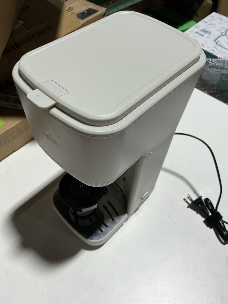 Condition photo showing As Is for bella single serve coffee maker, k cup & coffee ground compatible with removable, adjustable drip tray, auto shutoff & reusable dishwasher safe accessories, brews 6oz to 14oz, 1000 watt, oatmilk oatmilk 6oz-14oz