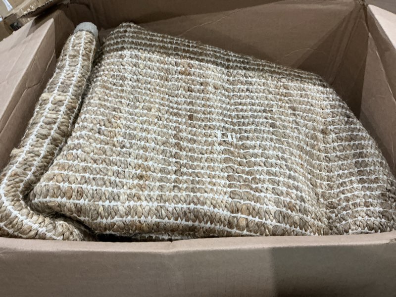 Condition photo showing As Is for chardin home jute cotton handwoven area rug | braided boho farmhouse rug in natural jute/ivory | rustic vintage floor covering for living room, bedroom, kitchen, and entryway