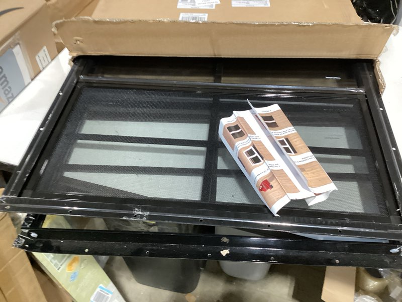 Condition photo showing As Is for neatiease upgraded shed windows 2 pack, 24" x 24" windows with tempered glass and stainless steel screen for shed, chicken coop, playhouse, household, garage(black) 24"x24" black