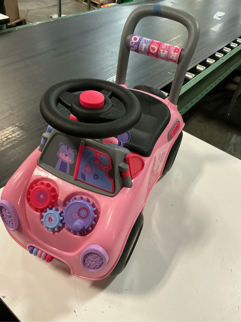 Condition photo showing As Is for radio flyer creativity car, 3 in 1 push walker & ride-on with interactive features, pink
