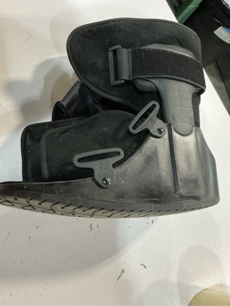 Condition photo showing Good Condition for united ortho short air cam walker fracture boot, large, black black large boot