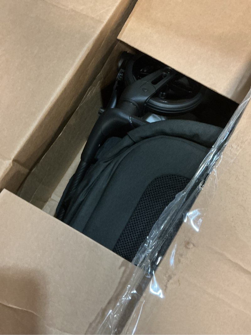 Condition photo showing As Is for mamazing air lux baby stroller with bassinet from newborn to 50 lbs, strength carbon fiber frame only 15.8lbs, bassinet stroller included reversible seat, car seat adapter & large storage basket black stroller + bassinet + adapter