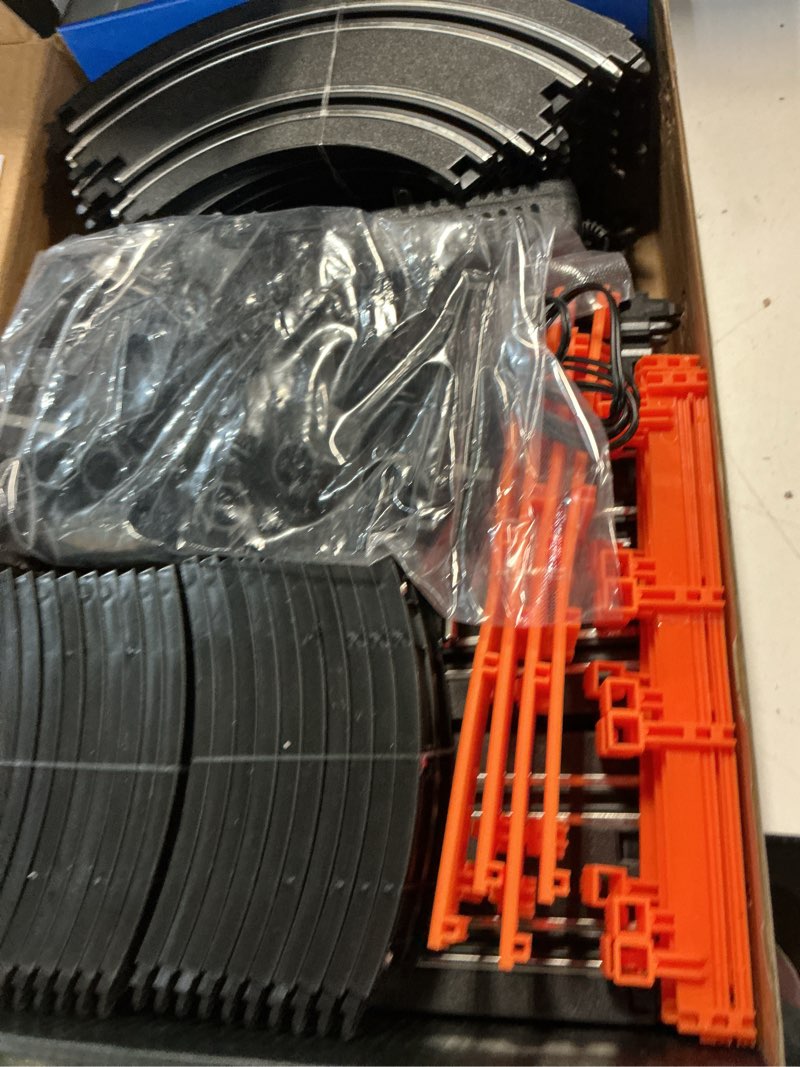 Condition photo showing As Is for slot car race track with 4 high-speed racing cars battery or electric race car toy for kids boys, dual racing game 2 hand controllers toys for girls children age 6,7,8-12 years old