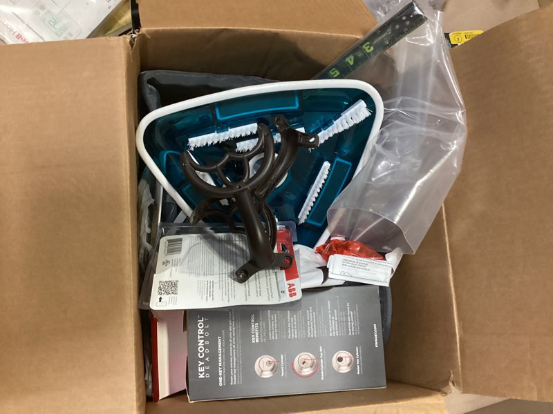 Condition photo showing As Is for title assorted home improvement lot (tool,screw,home accsseories etc.) 