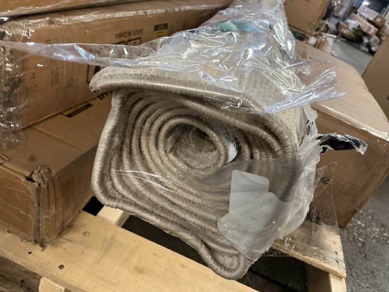 Condition photo showing As Is for Nourison Essentials Indoor/Outdoor Ivory Beige 6' x 9' Area Rug, Easy Cleaning, Non Shedding, Bed Room, Living Room, Dining Room, Backyard, Deck, Patio (6x9)