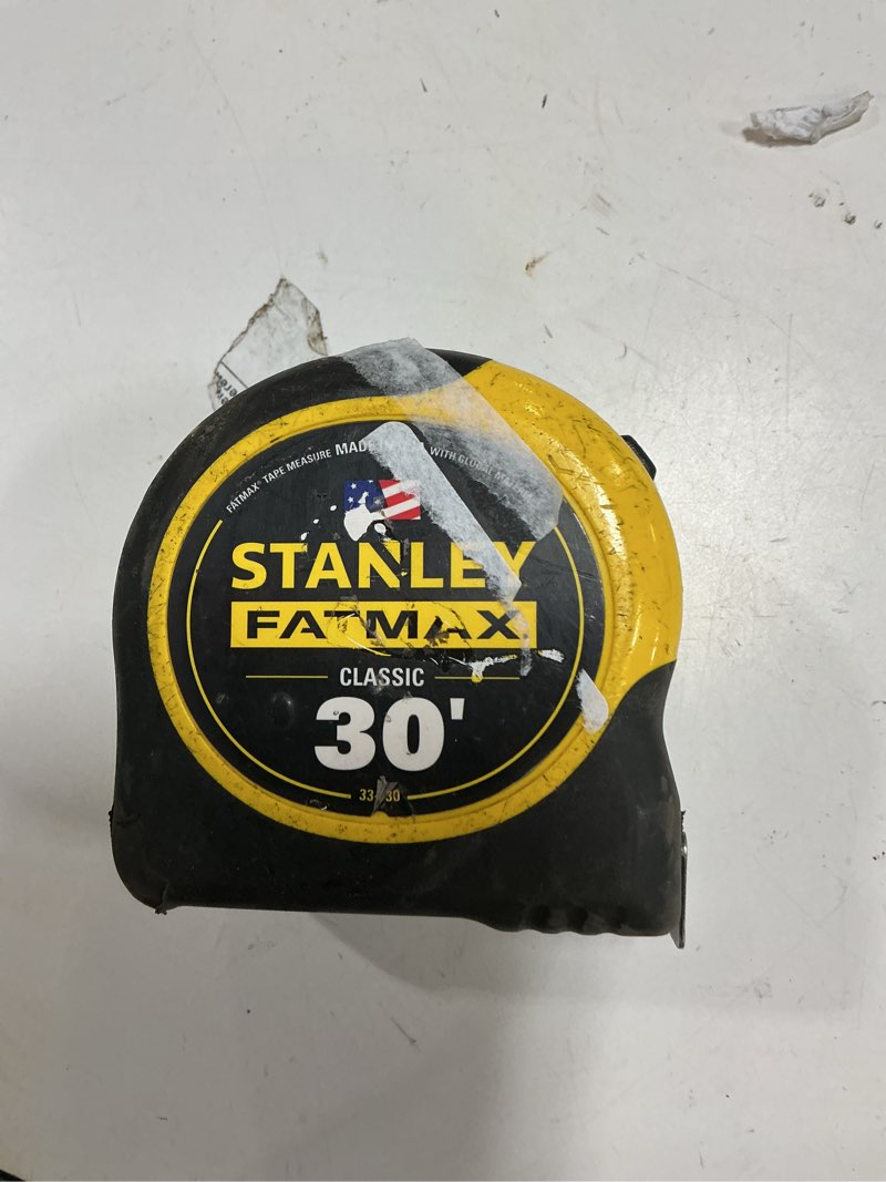 Condition photo showing As Is for stanley hand tools 33-730 1-1/4" x 30' fatmax® tape measure yellow/black 30 foot