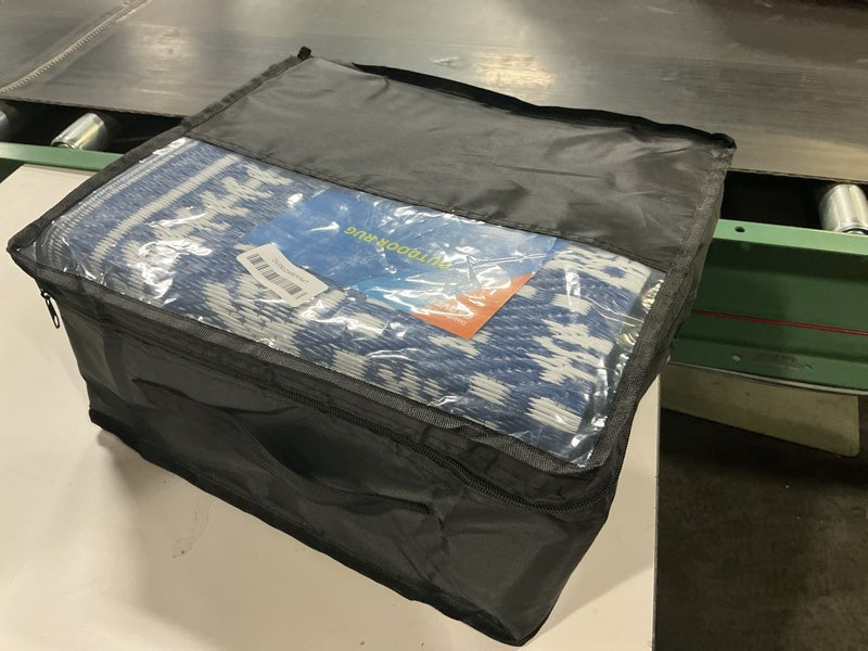 Condition photo showing New/Like New for garvee reversible outdoor rug 6x9 for patio, waterproof outdoor area rug, modern medallion indoor outdoor rugs, plastic straw rug for rv, camping, deck, vintage navy navy & white 6' x 9' (rectangular)