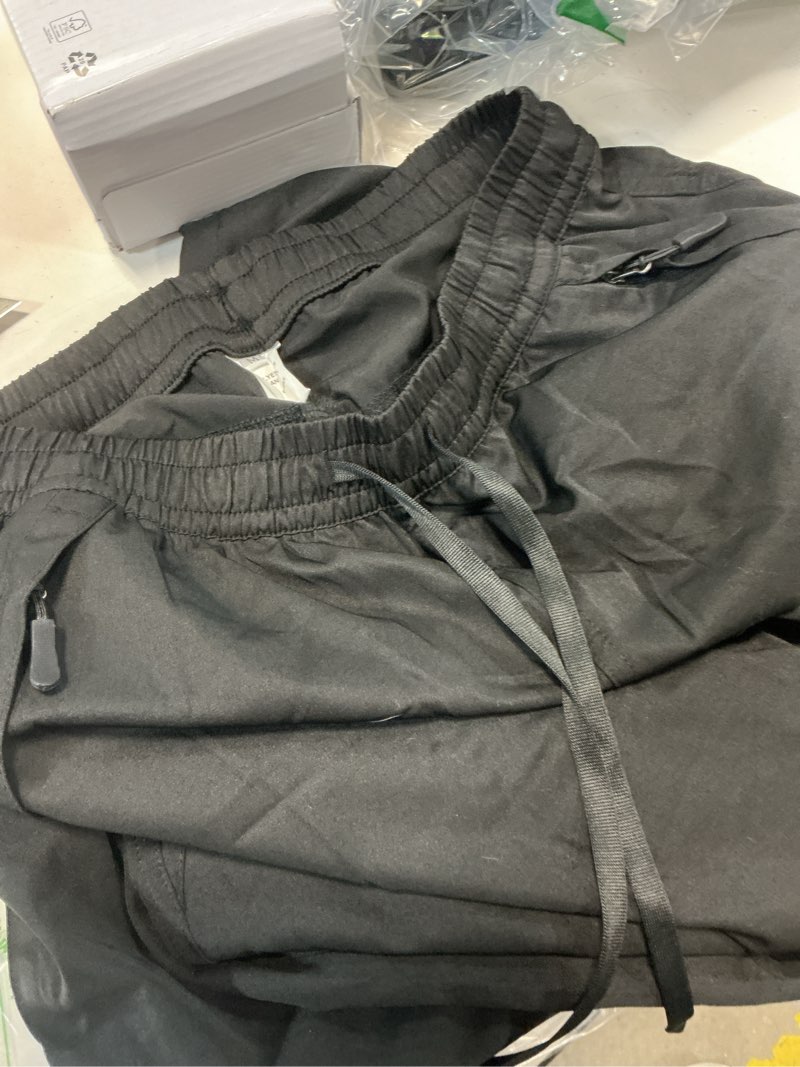 Condition photo showing Good Condition for womens hiking pants quick dry upf 50 lightweight travel golf cargo safari pants zipper pockets medium petite black