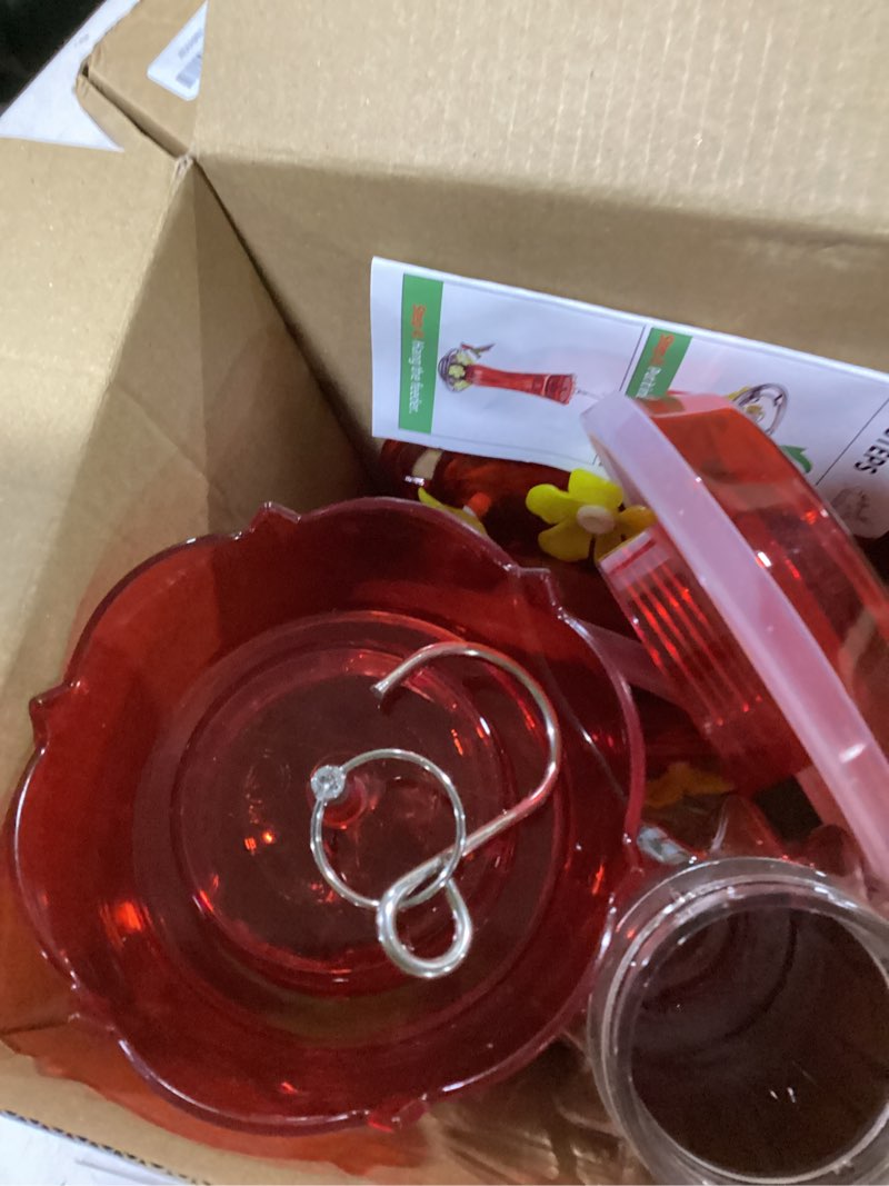 Condition photo showing As Is for jealoeur 2 pack hummingbird feeder for outdoors hanging, 18 oz humming birds feeders with 6 bee guard feeding ports & built-in ant moat, easy to clean, durable outdoor garden decor(clear aa) 2 clear red aa