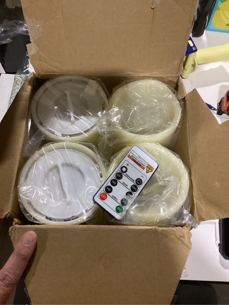 Condition photo showing Good Condition for 4 packs flameless candles, battery operated with remote, real wax flickering led candles, for home fall halloween christmas party candelabra d3 xh6(ivory) ivory-real wax