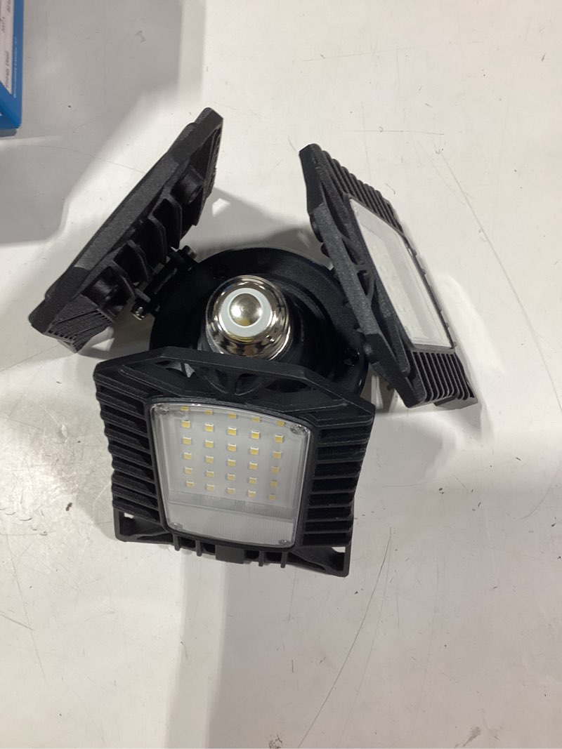 Condition photo showing As Is for utilitech 1-ft 8000-lumen black 3-light led diffuser garage shop light