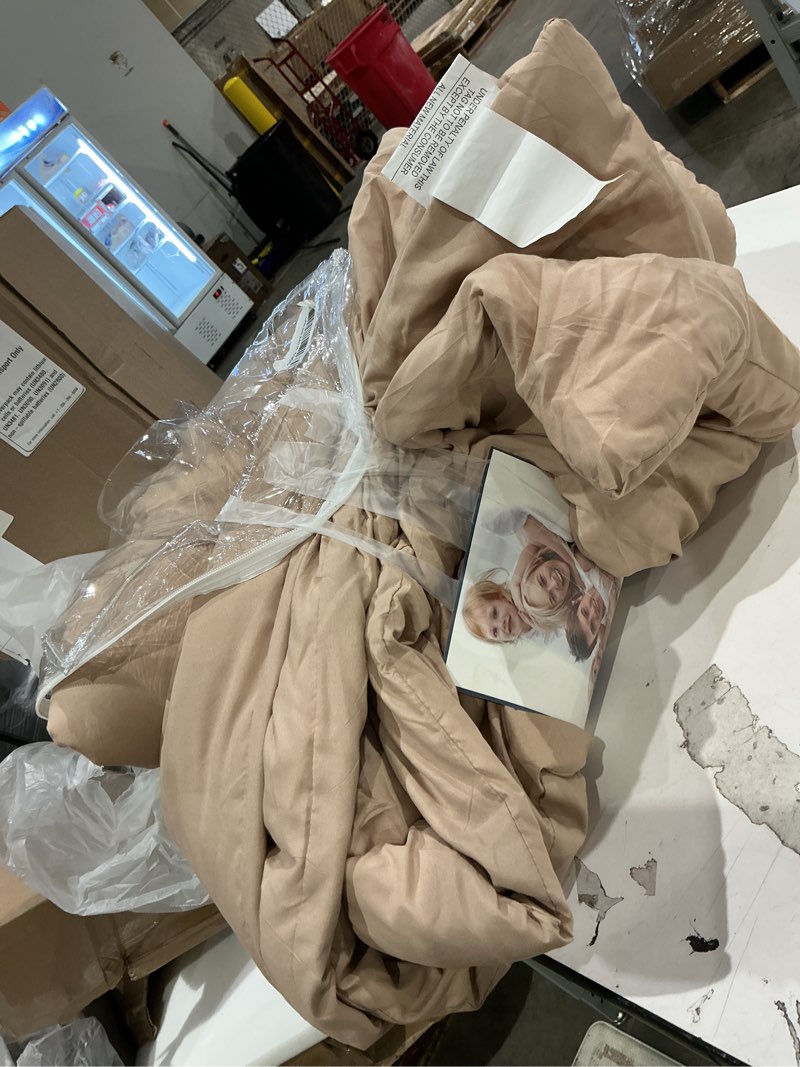 Condition photo showing As Is for cozylux king size comforter khaki
