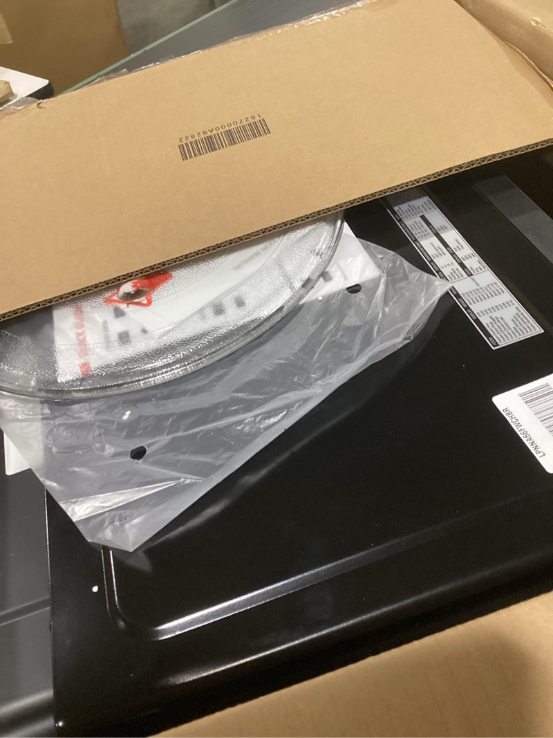 Condition photo showing Good Condition for toshiba air fryer combo 8-in-1 countertop microwave oven, with convection, broil, odor removal mode, 12.4" position memory turntable, child-lock, 1.0 cu.ft, black stainless steel, ml2-ec10sa(bs) air fryer-1.0 cu.ft.
