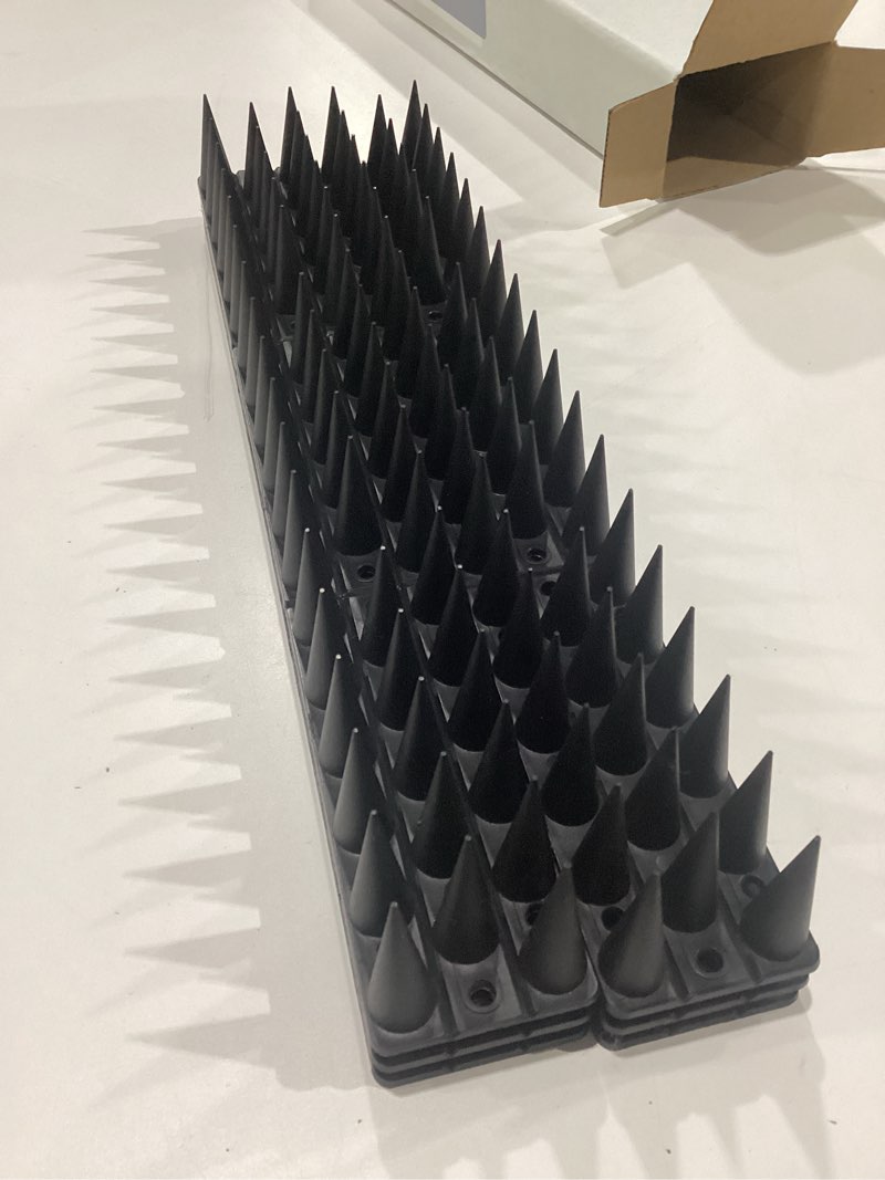 Condition photo showing New/Like New for bird & animal deterrent spikes, 6 packs outdoor plastic spike strips for roof, ledges, fence, walls & railing, humane squirrel, raccoon & pigeon barrier, 6 ft coverage, black 6 ft coverage black