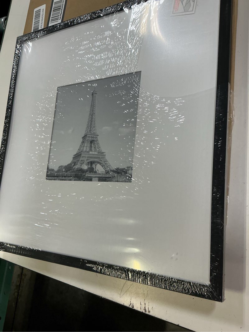 Condition photo showing Good Condition for (its a broken) upsimples 18x18 picture frame, display pictures 8x8 with mat or 18 x 18 without, wall hanging square frames, black, 1 pack black 18x18