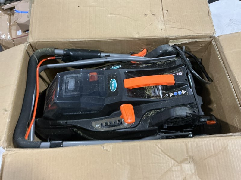 Condition photo showing As Is for scotts 62014s 14" 20v cordless lawn mower, black