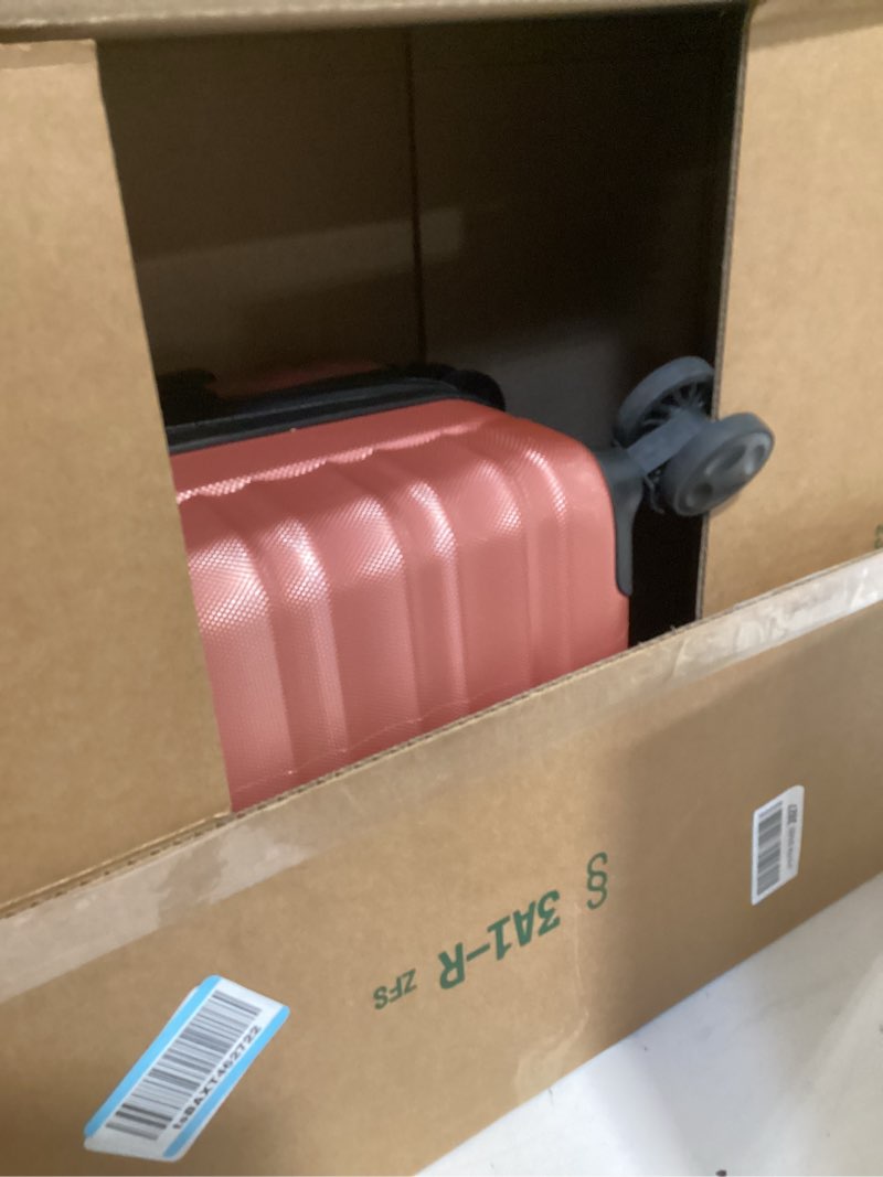 Condition photo showing Good Condition for amazon basics 21" hardside carry-on luggage with multi-directional wheels, expandable for up to 25% more space, scratch-resistant surface, rose gold rose gold carry-on