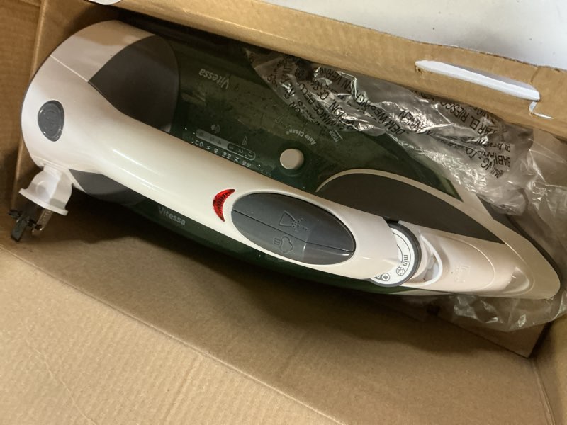Condition photo showing As Is for black+decker vitessa advanced steam iron, icr2020, even steam nonstick soleplate, auto shutoff, tangle-free retractabel cord, green
