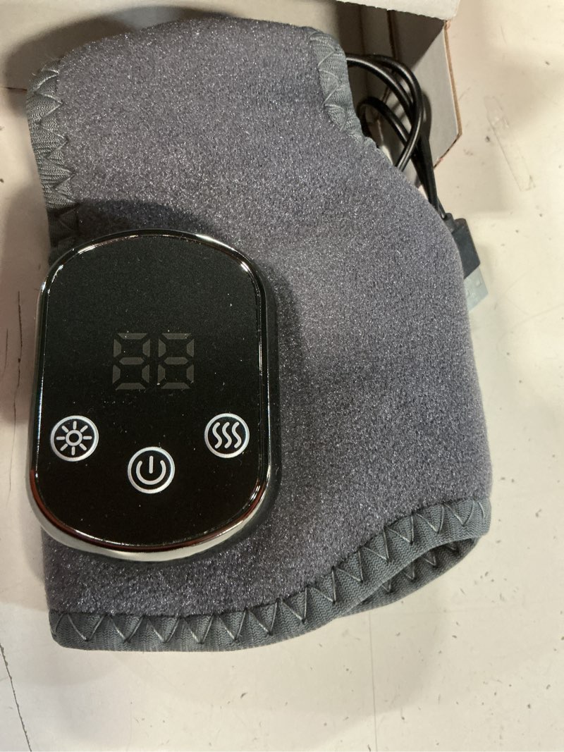 Condition photo showing As Is for cordless ankle massager with heat, ankle heating pad, usb rechargeable heated brace wrap warmer, 5 heat levels, 3 vibration modes, auto shut off