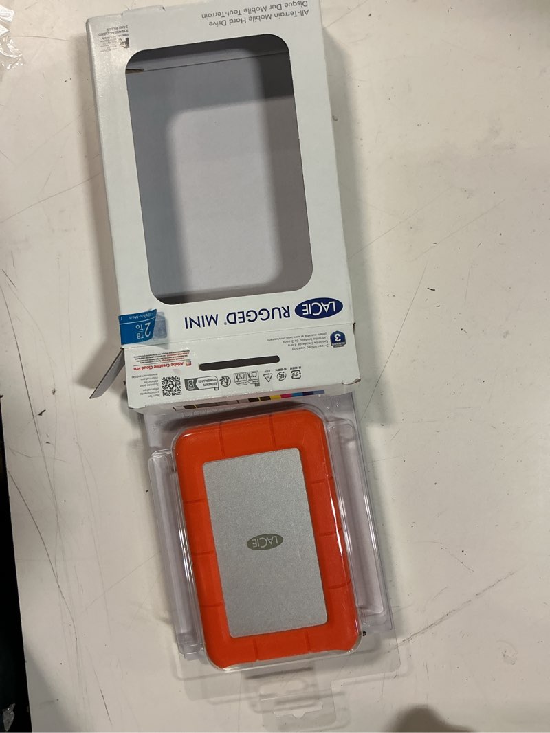 Condition photo showing New/Like New for lacie rugged mini 2 tb portable external hard drive lac9000298