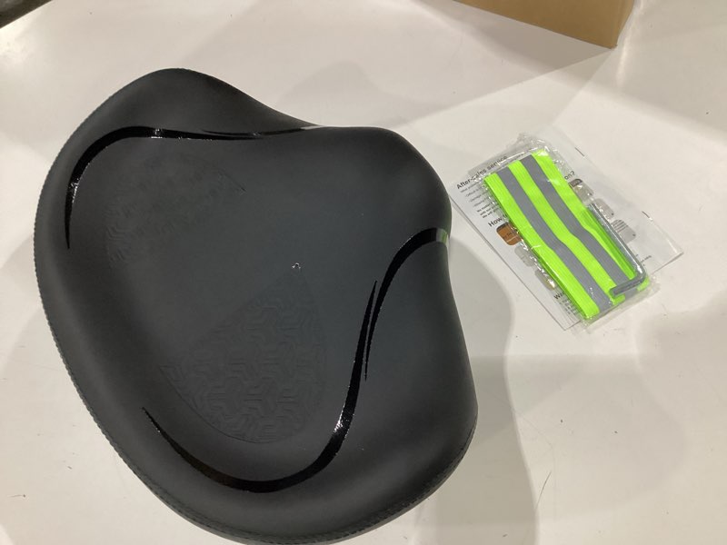 Condition photo showing New/Like New for noseless bike seat cushion for men & women - extra padding & comfort wide bicycle seat, oversized comfortable saddle for peloton bikes, exercise bikes, electric bikes, cruiser bikes noseless-oversized black
