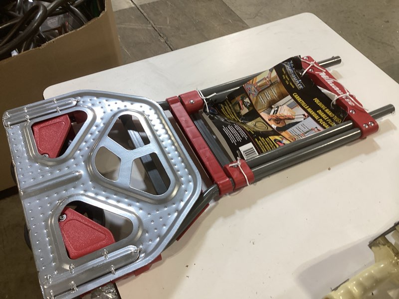Condition photo showing As Is for milwaukee collapsible folding hand truck 150 lb