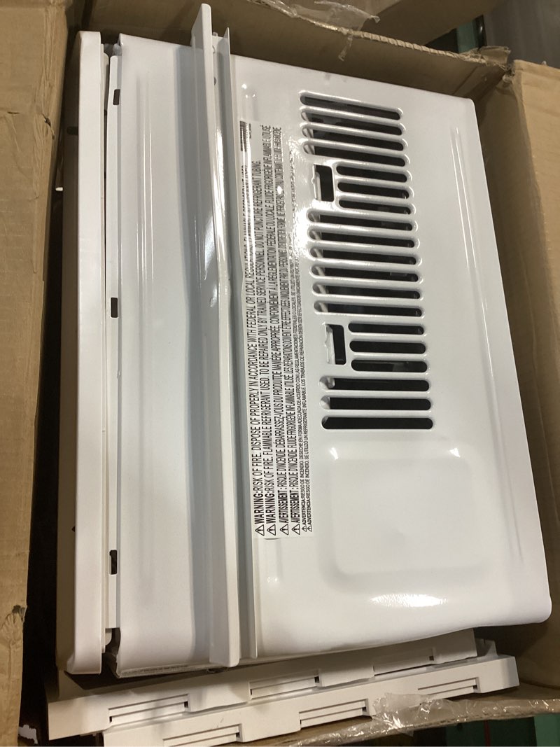 Condition photo showing As Is for lg 6,000 btu window air conditioner, cools 250 sq.ft. (10' x 25' room size), quiet operation, electronic control with remote, 2 cooling & fan speeds, 2-way air deflection, auto restart, 115v