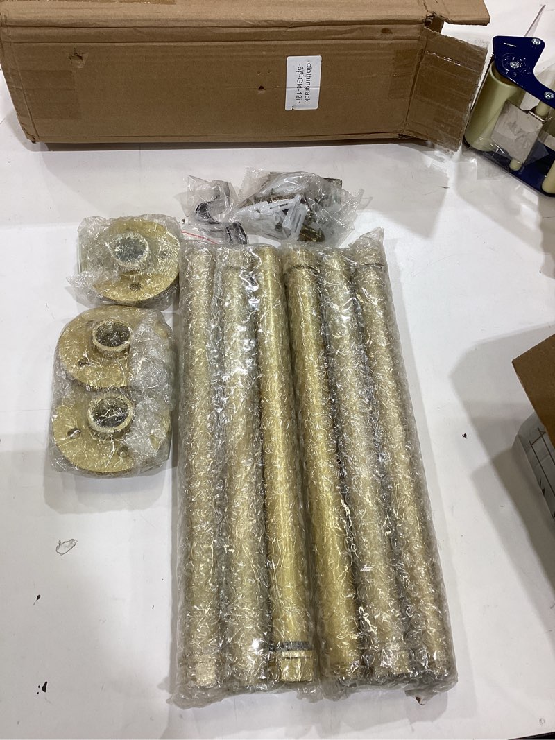 Condition photo showing Good Condition for 6 Pcs Industrial Pipe Clothes Bar 12 Inch - Wall Mount Clothing Rack - Face Out Closet Rods for Hanging Clothes Commercial Retail Boutique Laundry Shirt Display - Golden Golden 12" Clothes Rack