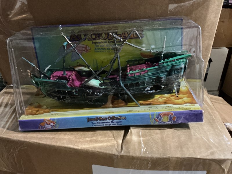 Condition photo showing New/Like New for Penn-Plax Shipwreck Aquarium Decoration Ornament with Moving Masts, Lifeboat, and Bubble Action