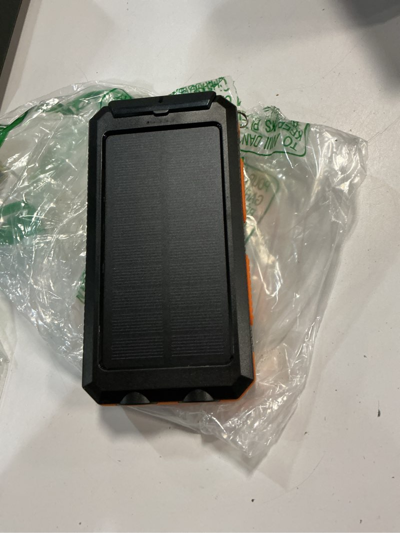 Condition photo showing Good Condition for Solar Charger Power Bank 20,000mAh, Portable Charger, 4 Cables 3 Ports Fast Charging External Battery Pack with USB C for Cell Phones, Solar Panel Charger with Dual Flashlight for Camping